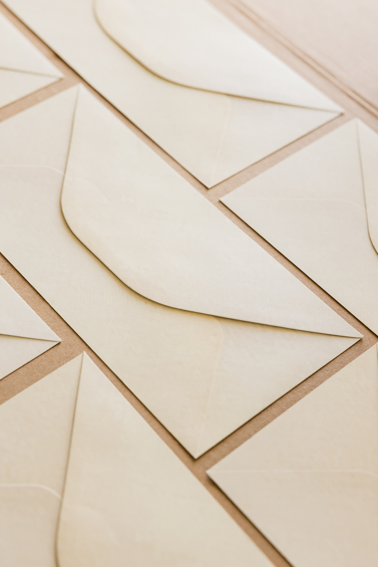Envelopes Laid Out on Brown Background